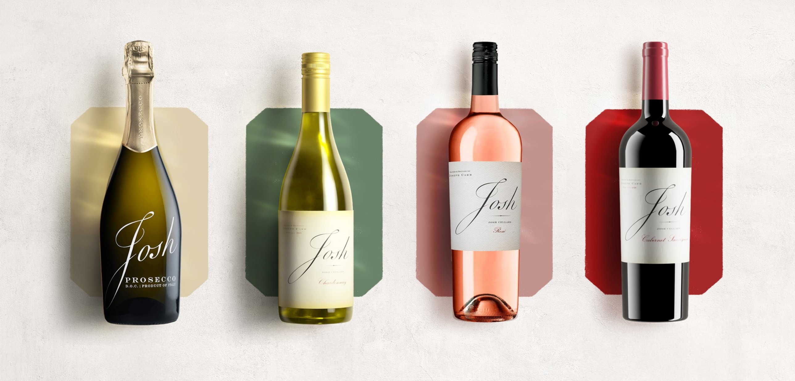 Four Josh Cellars bottles, Prosecco, Chardonnay, Rose and Cabernet Sauvignon, each on a colored backdrop